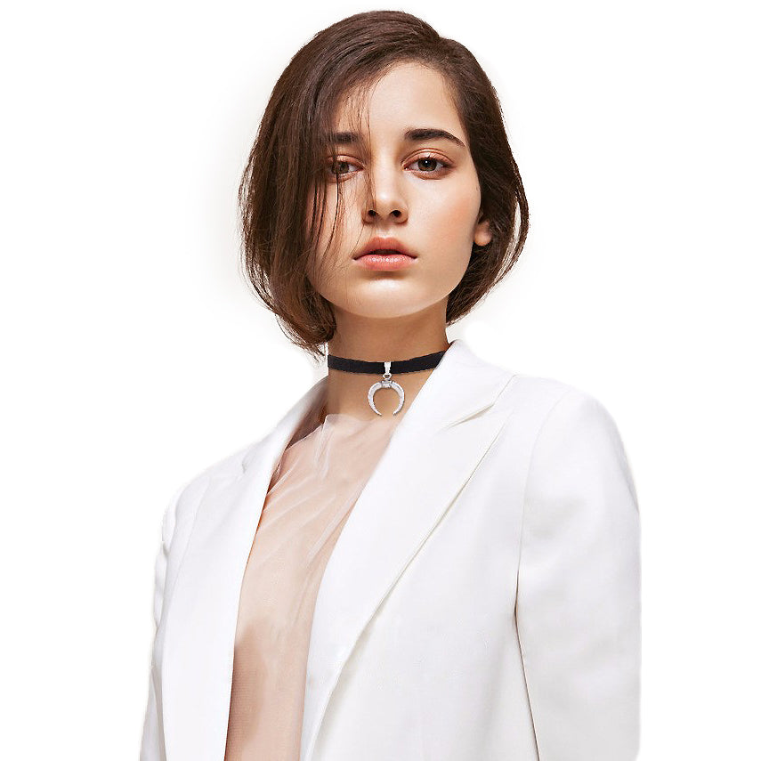 Gothic black velvet collar with moon pendant worn by a model, perfect for stylish bondage accessories.