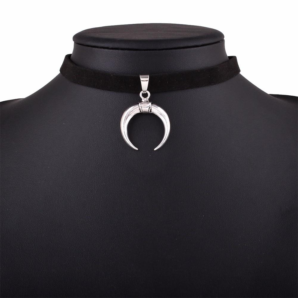 Black velvet collar choker with silver half-moon pendant, perfect for gothic style and versatile outfits.