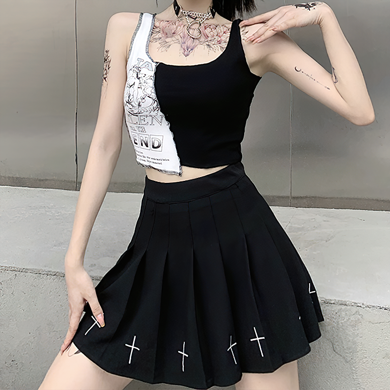 Alternative women's black and white tank top paired with a stylish black skirt, showcasing edgy summer streetwear.