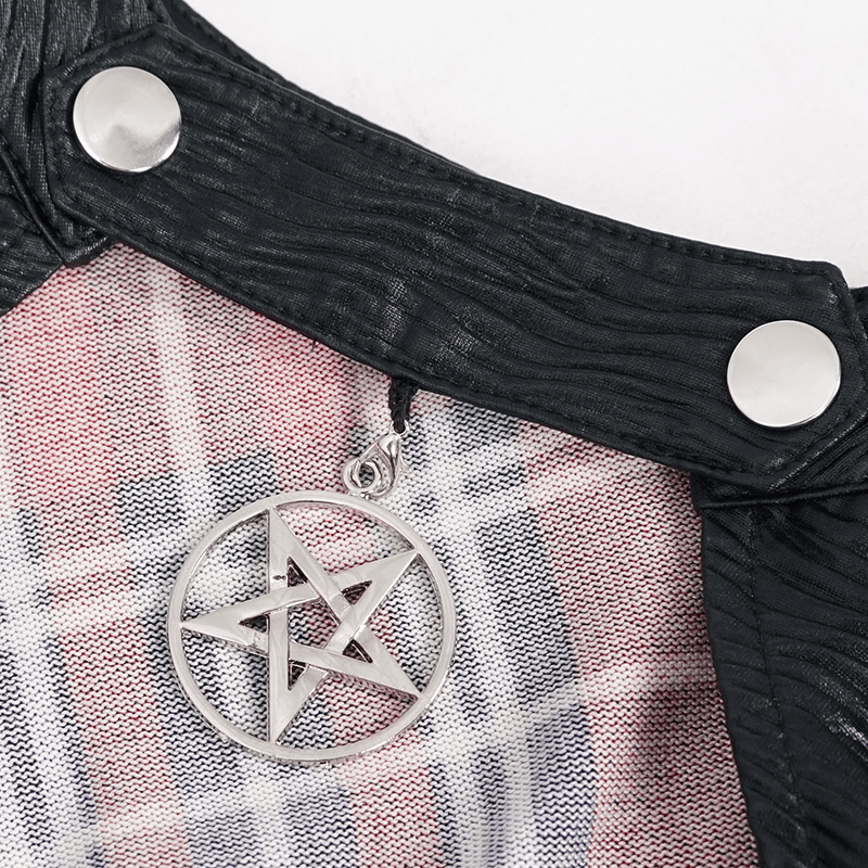 Close-up of black collar with silver pentagram pendant on punk checkered dress, adding a grunge touch.