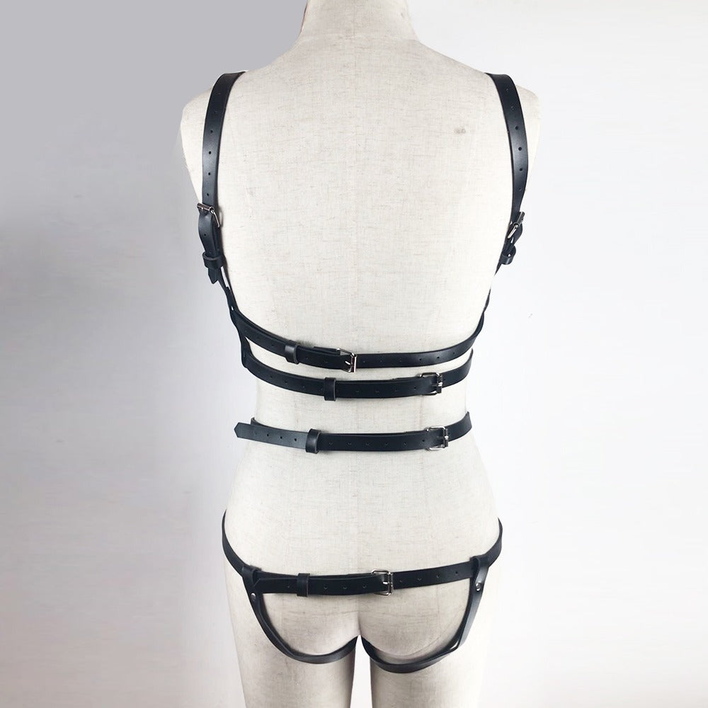 Black women's leather bondage garter belt set displayed on mannequin, featuring strong buckles and geometric design.