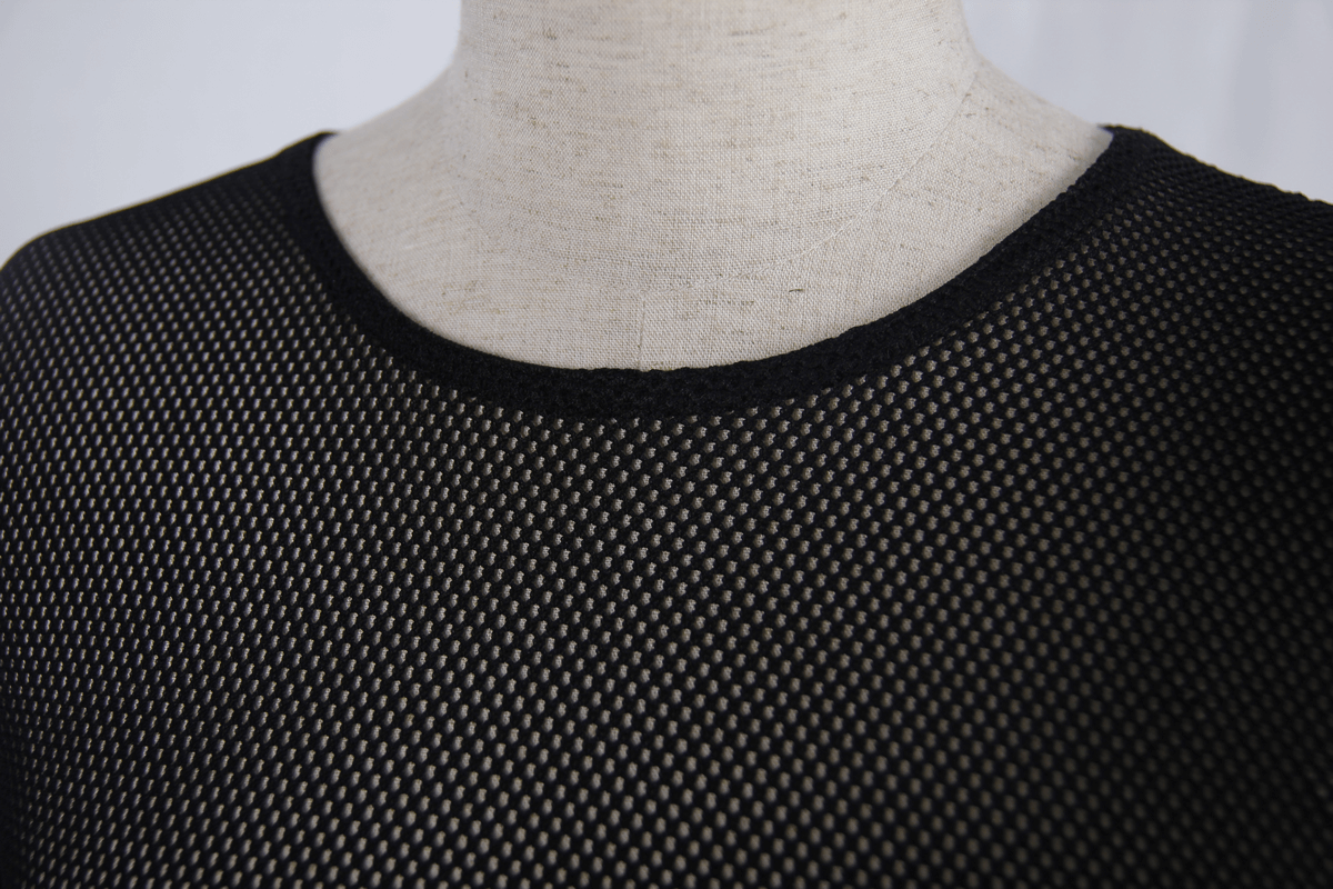 Close-up of a black women's O-neck mesh top with intricate weaving, showcasing modern steampunk design features.