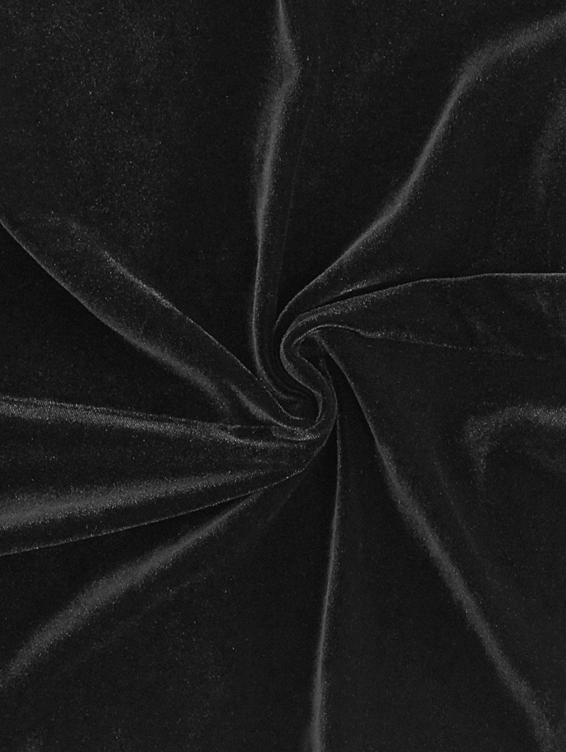 Close-up of soft black velvet fabric, ideal for gothic style dresses and elegant attire.