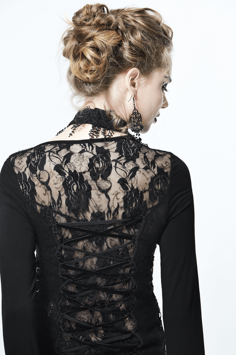 Elegant black lace top with an asymmetrical cut showcasing a gothic style and intricate floral details on the back.