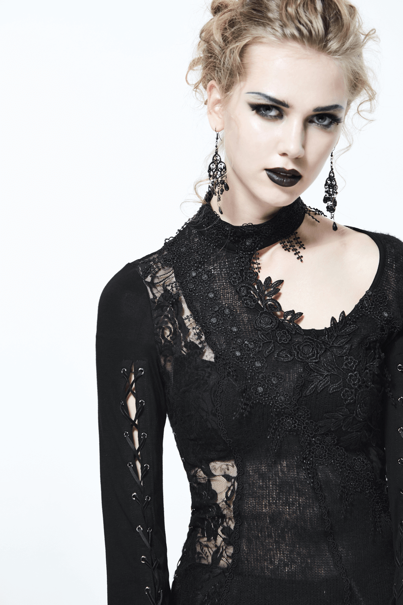 Gothic black lace top model showcasing elegant details and asymmetrical cut, perfect for a dramatic look.