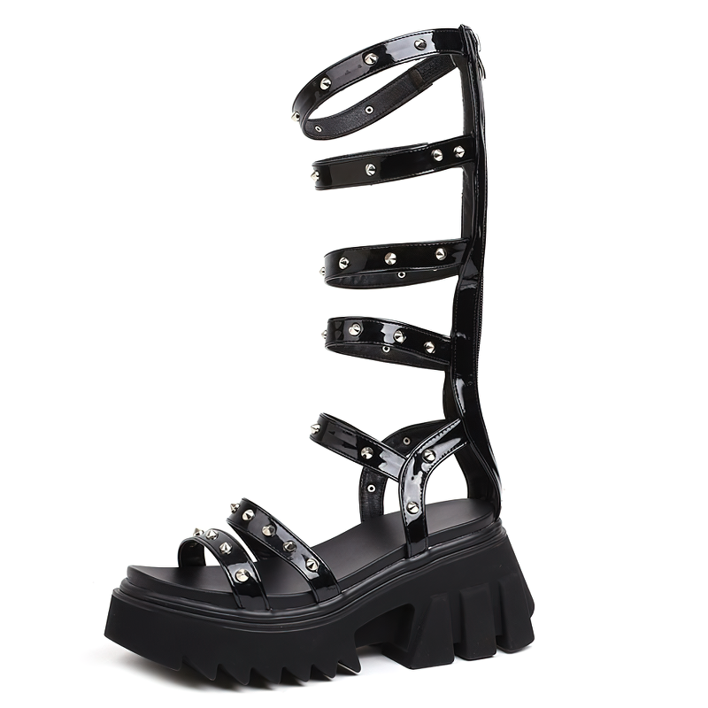Stylish black zipper gladiator sandals with platform heels and sparkling details for a trendy look.