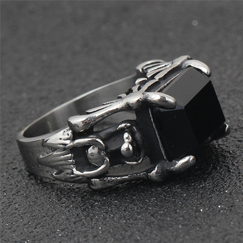 Gothic black zircon ring in 316L stainless steel with unique skull design, perfect for occult jewelry enthusiasts.