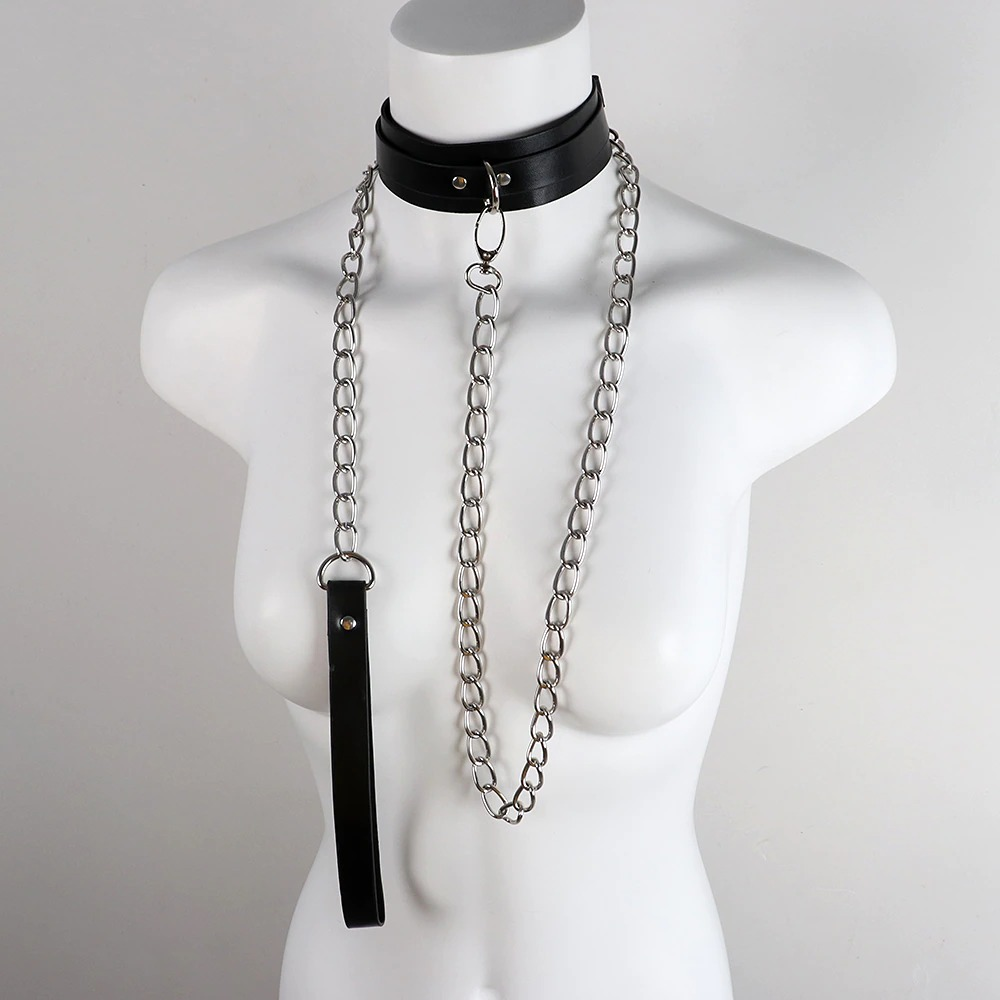 Stylish bondage collar with metal chain and leather leash for cosplay or themed parties.