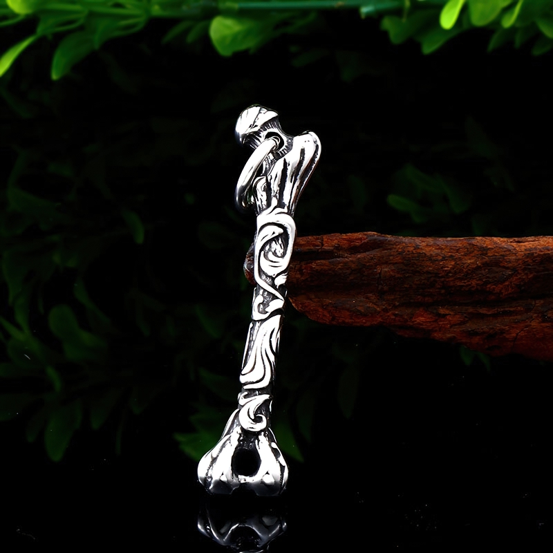 Stainless steel bone pendant showcasing intricate rock style design, ideal unisex accessory for gothic fashion.