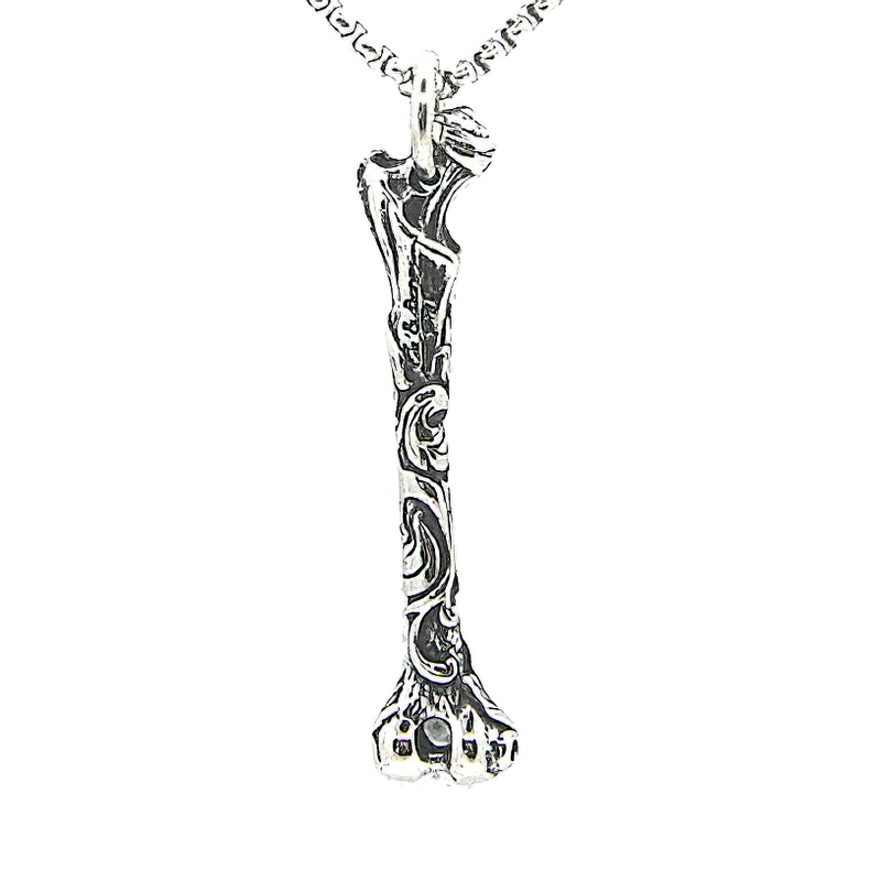 Unisex stainless steel bone pendant necklace in rock style, perfect for gothic accessories and trendy outfits.