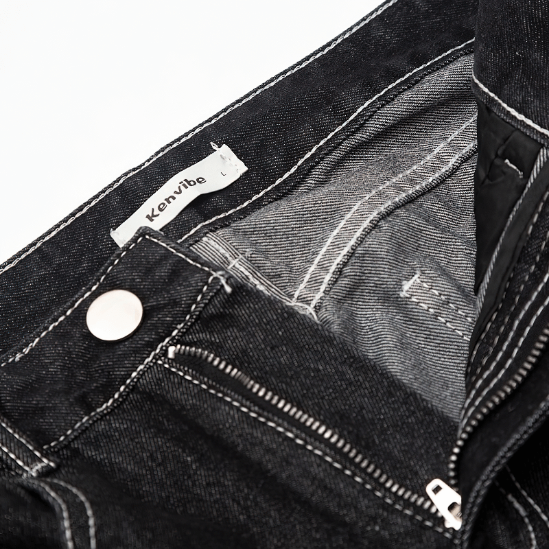 Close-up of Bone Print men's jeans interior showing label and zipper details for alternative style clothing.