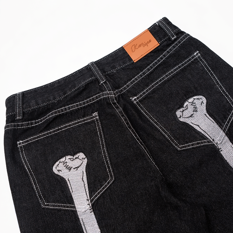 Men's bone print jeans featuring unique bone graphics on the back pockets, stylish alternative fashion for casual wear.