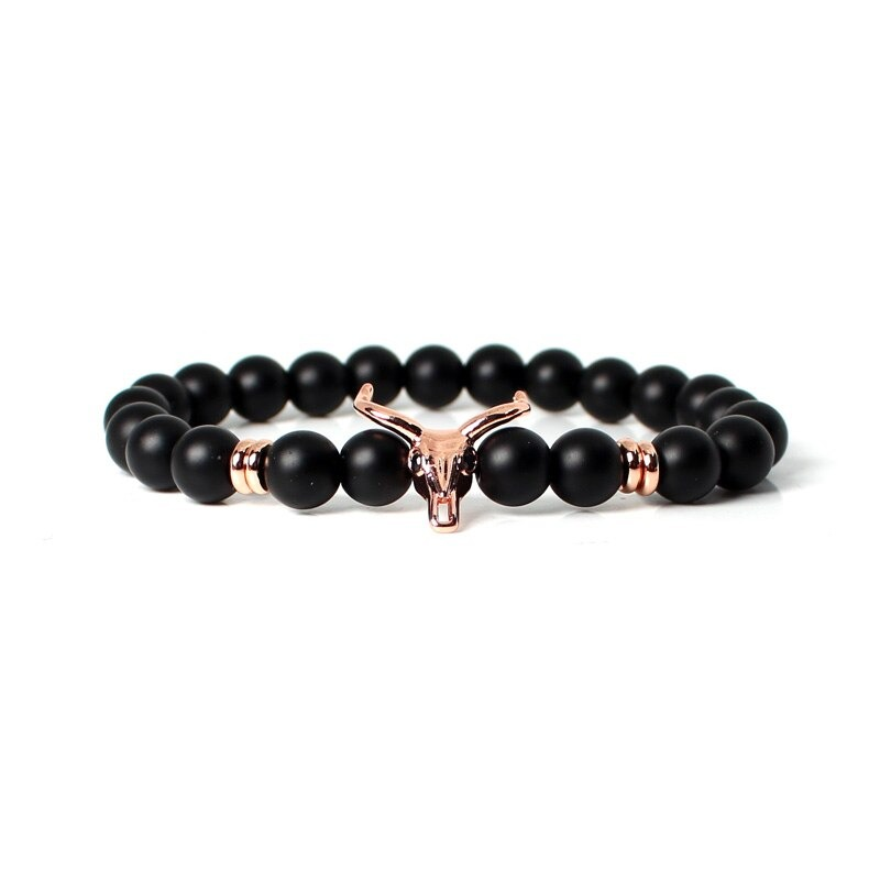 Stylish men's bracelet with black beads and silver skull centerpiece for modern jewelry.