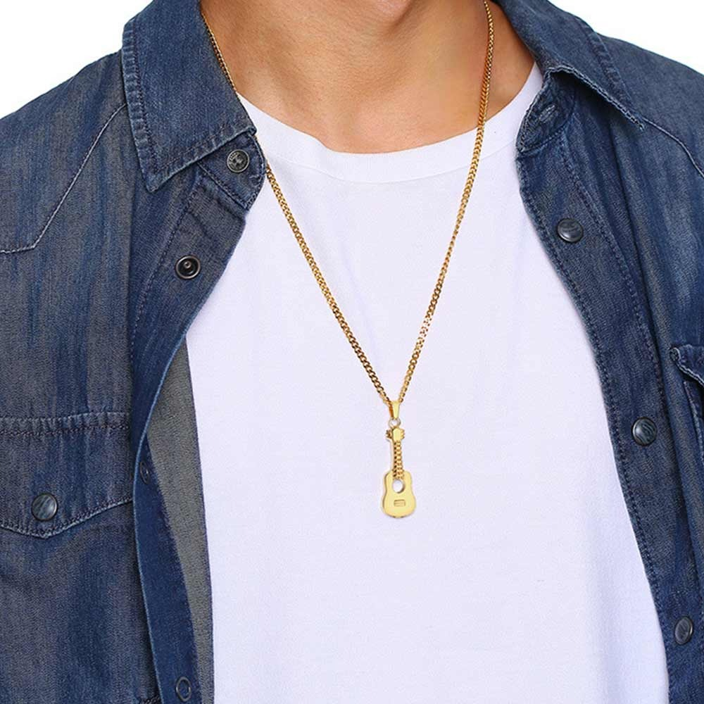 Stylish stainless steel necklace with guitar pendant worn by a man in casual outfit, perfect for music lovers.