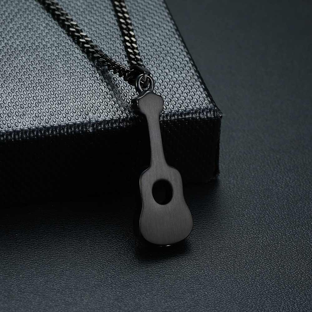 Stylish stainless steel necklace featuring a guitar pendant, perfect for casual outfits and music lovers.