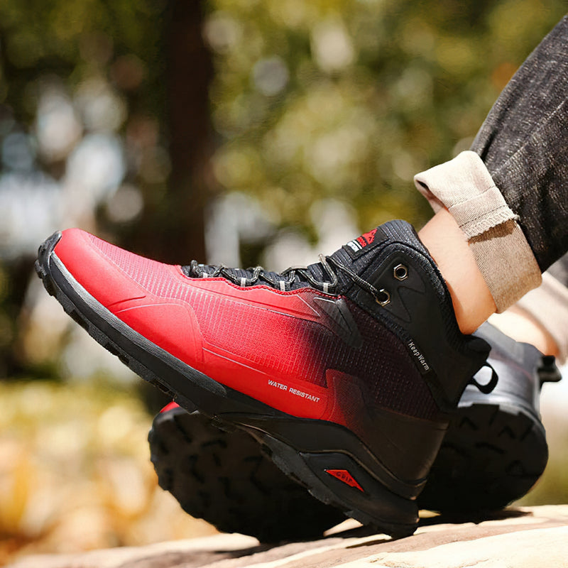 Warm men's boots in black and red, perfect for snowy, wet conditions, combining style and comfort.