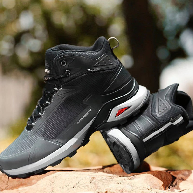 Stylish black snow waterproof men's boots for winter, ideal for cold weather and ski resorts.