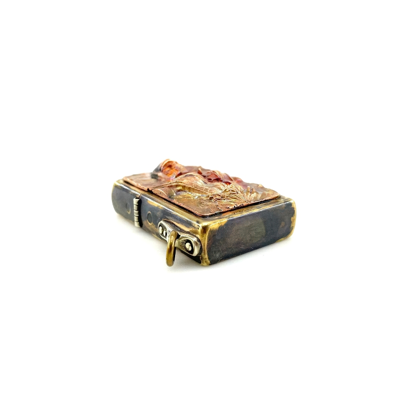 Brass portable lighter case featuring a detailed samurai skull design, perfect for rock style accessory lovers.