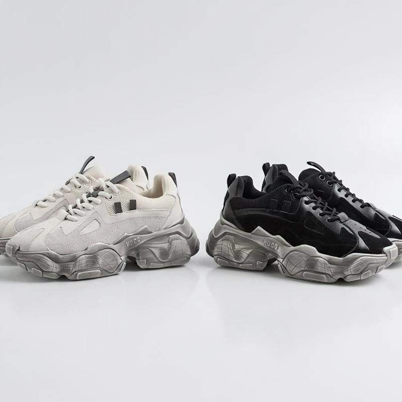 Stylish breathable women's sneakers in white and black on a cool platform, perfect for casual wear and comfort.