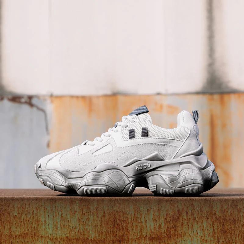 Stylish breathable genuine leather women's sneakers on a cool platform, perfect for casual wear and ultimate comfort.