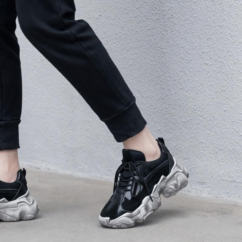 Breathable genuine leather women's sneakers on a cool platform, perfect for casual and stylish outfits.