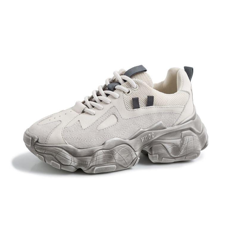 Trendy breathable sneakers in light beige with a chunky sole, perfect for casual wear and fashion-forward comfort.