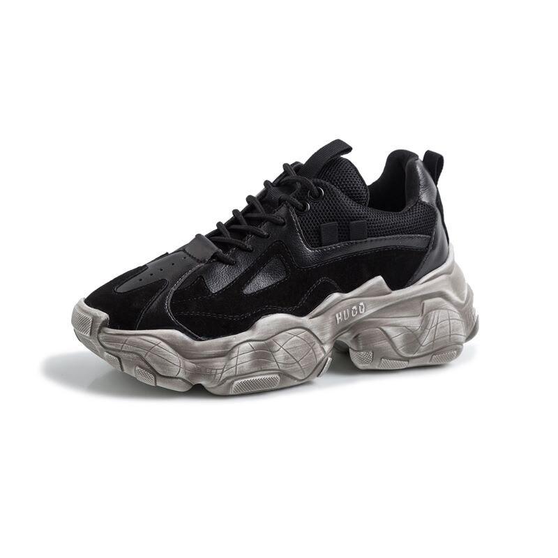 Breathable black platform sneakers in genuine leather for women's casual footwear, perfect for stylish comfort.