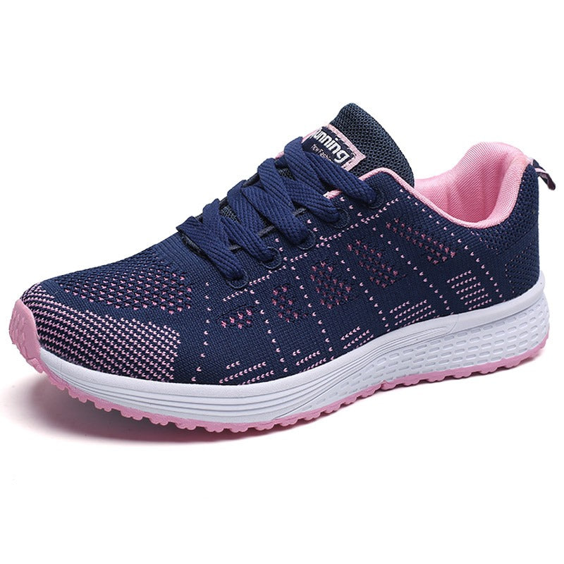 Women's breathable mesh lace-up sneakers in navy and pink, perfect for comfort and style in any outfit.