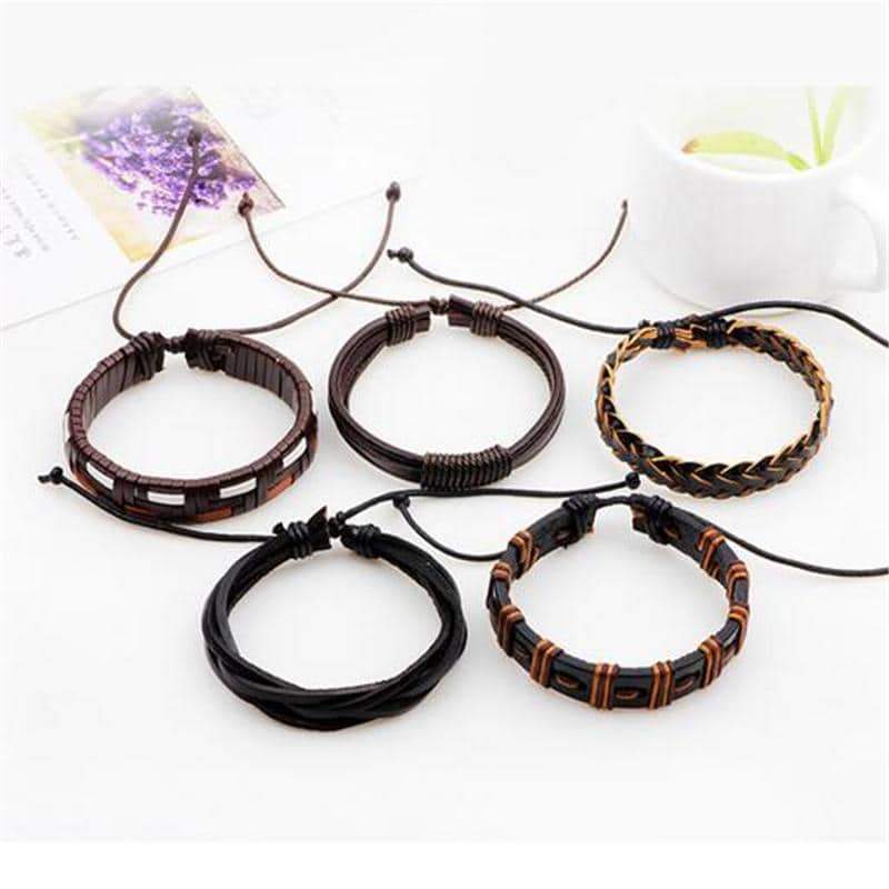Set of 5 braided leather bracelets in brown and black, perfect for adding a rock style to any outfit.
