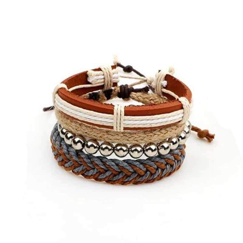 Set of 4 brown braided rope and leather bracelets in rock style with silver accents, perfect for men's fashion.