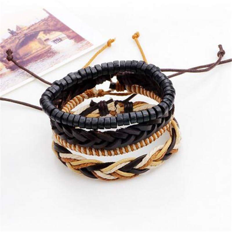 Set of 4 braided leather bracelets in black and natural tones for men and women, perfect for a rock style look.
