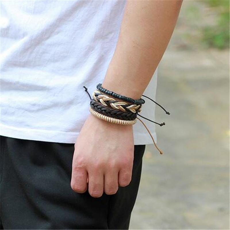 Stylish brown braided leather bracelet set on wrist, perfect for rock style, unisex, and versatile for any outfit.