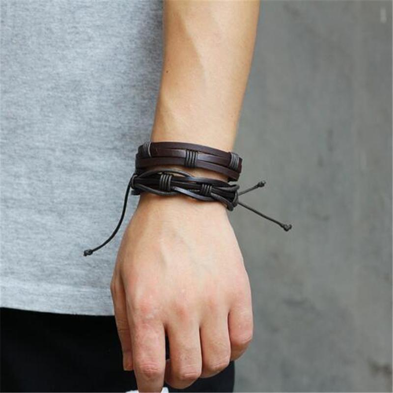 Stylish brown leather bracelet set on wrist, showcasing a rock style and braided design, perfect for men.