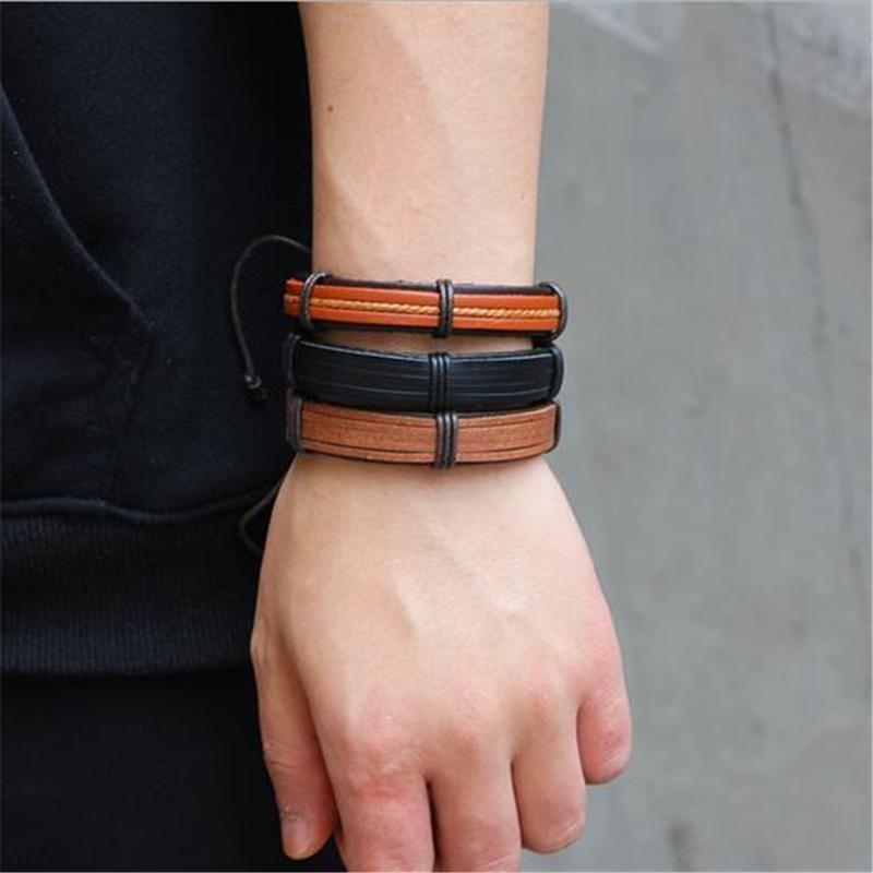 Stylish brown leather bracelet set of 5 on a man's wrist, featuring unique rock style and adjustable design.