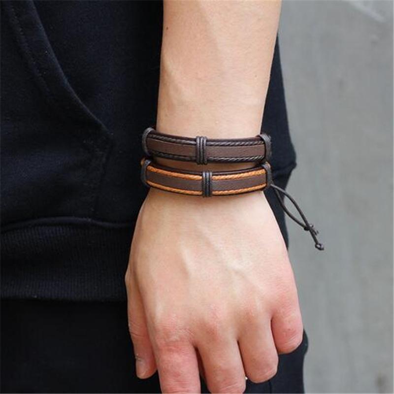 Stylish brown leather bracelet set on a wrist, showcasing a rock style design and adjustable fit.