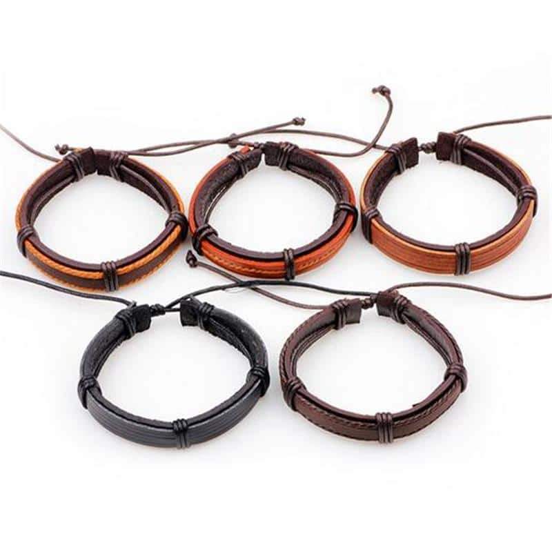 Set of 5 brown leather rock style bracelets, featuring adjustable designs and unique knitted textures.