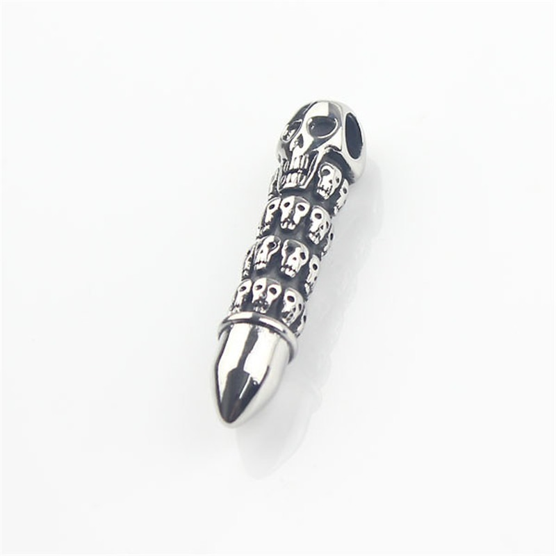 Bullet shape pendant necklace with engraved skulls for alternative fashion lovers.