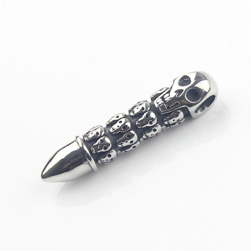 Bullet-shaped pendant necklace with skull engravings, perfect for alternative fashion enthusiasts.
