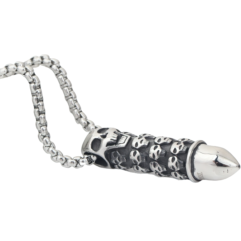 Bullet shape pendant necklace with skull engravings, a unique piece of alternative fashion jewelry.