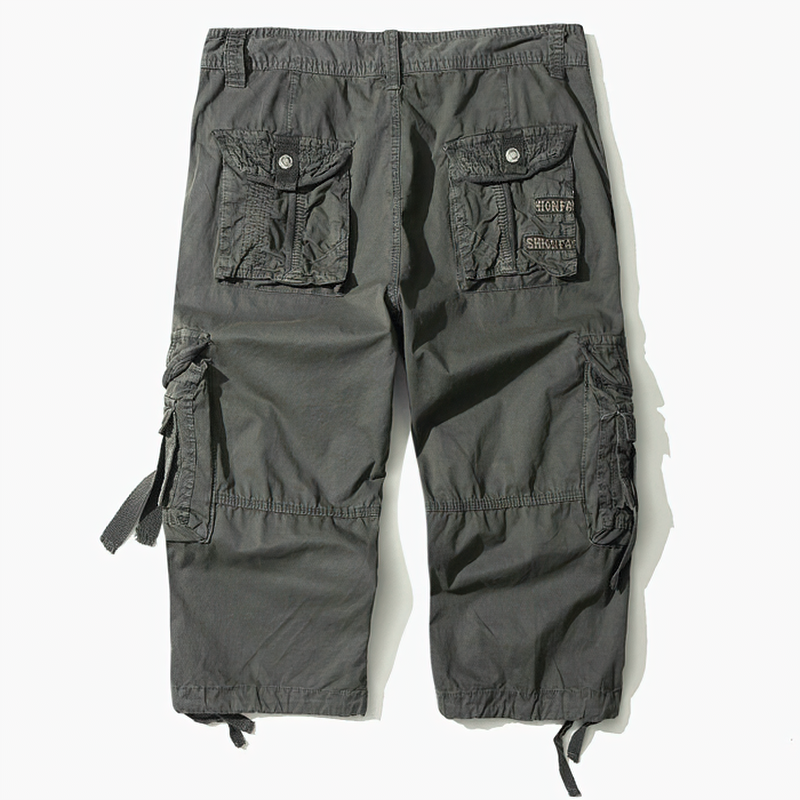 Camouflage loose cargo shorts for men, perfect for outdoor activities and casual safari style in warm weather.