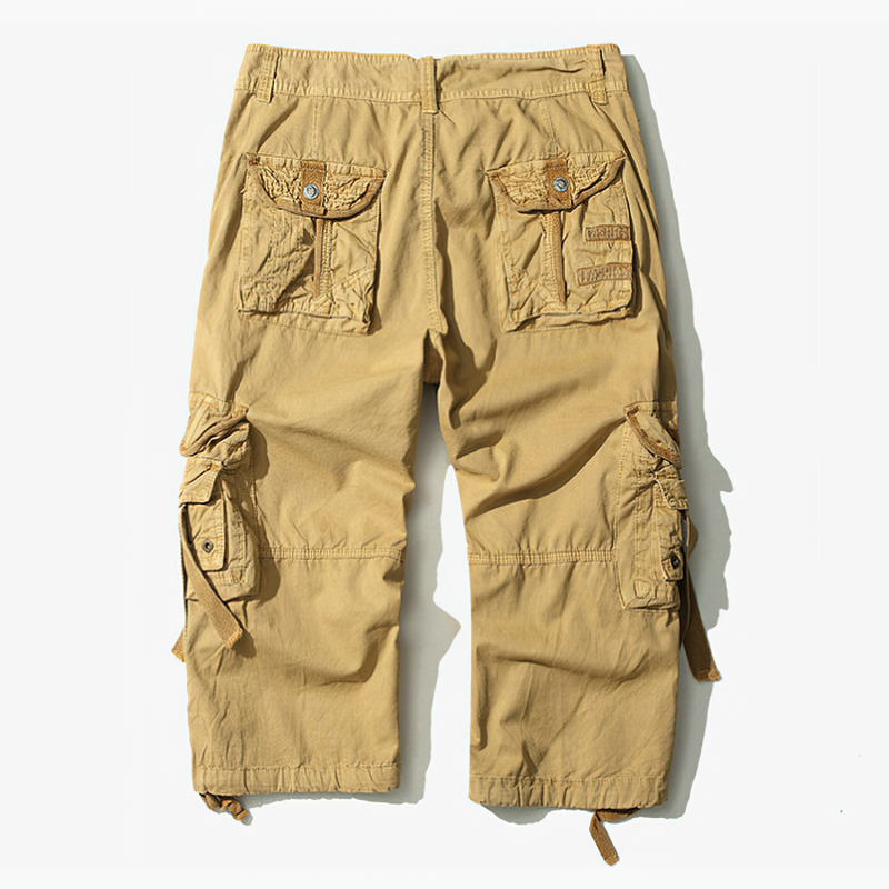 Back view of stylish beige camouflage cargo shorts for men, perfect for outdoor activities and warm weather wear.