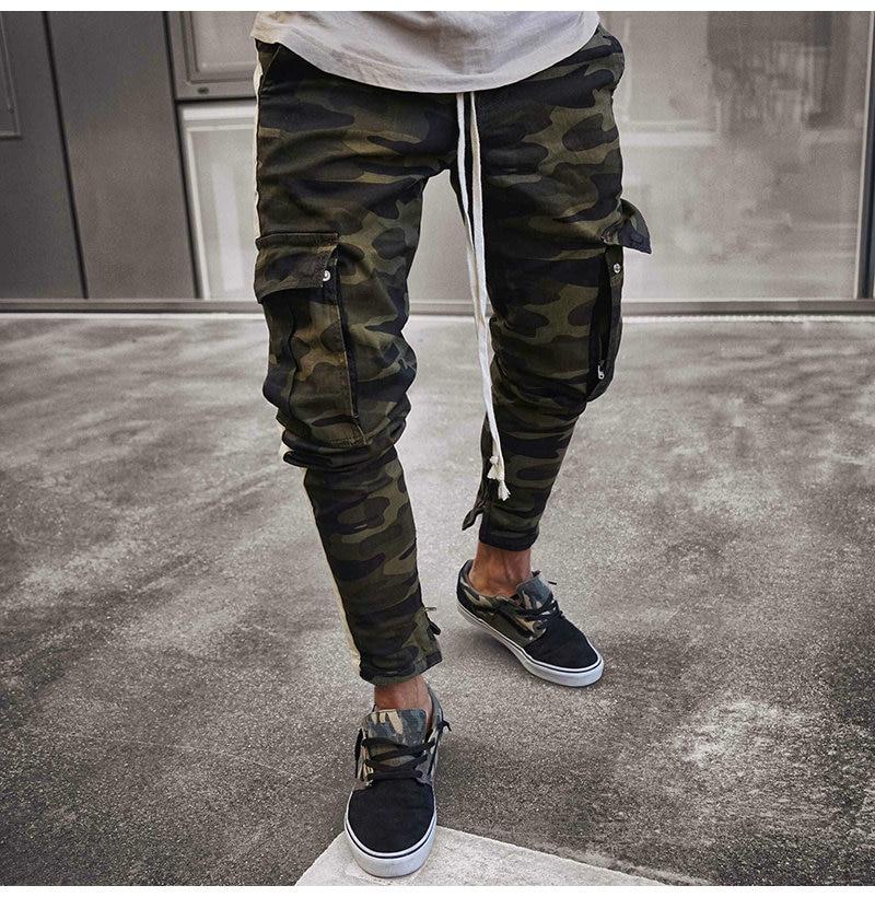 Men's camouflage joggers pants with pockets, slim fit style for sports and leisure activities.