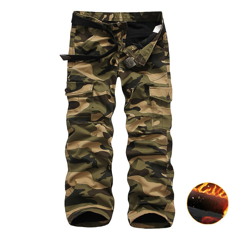 Camouflage tactical pants in army green, featuring multiple pockets and a comfortable fit for outdoor activities.