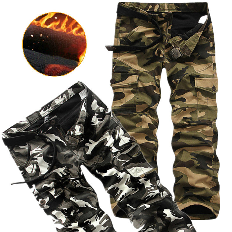 Men's camouflage tactical pants in black and green, featuring multiple pockets and durable cotton fabric.