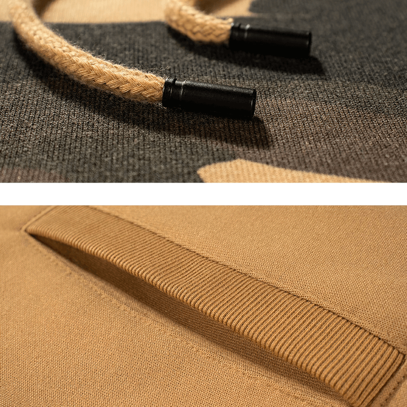 Close-up of men’s camouflage fleece hoodie details, featuring stylish drawstrings and ribbed hem for an alternative look.