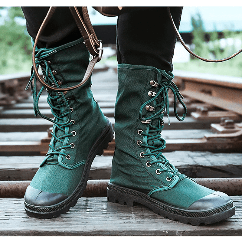 Stylish green canvas mid-calf lace-up boots for men, ideal for casual wear and military-inspired fashion.