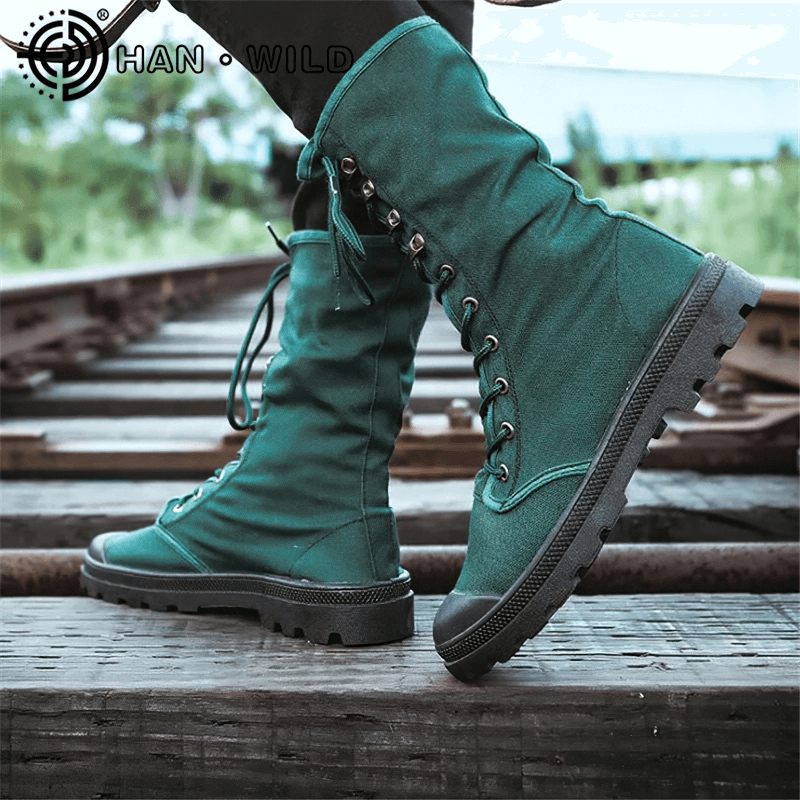 Green canvas mid-calf lace-up boots for men, ideal for casual wear and outdoor adventures.