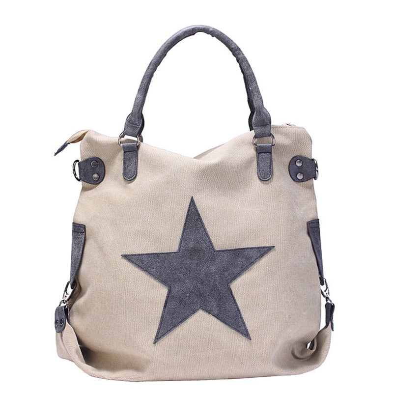 Canvas women's shoulder bag with large star, stylish vintage design, spacious matte leather, perfect for everyday use.