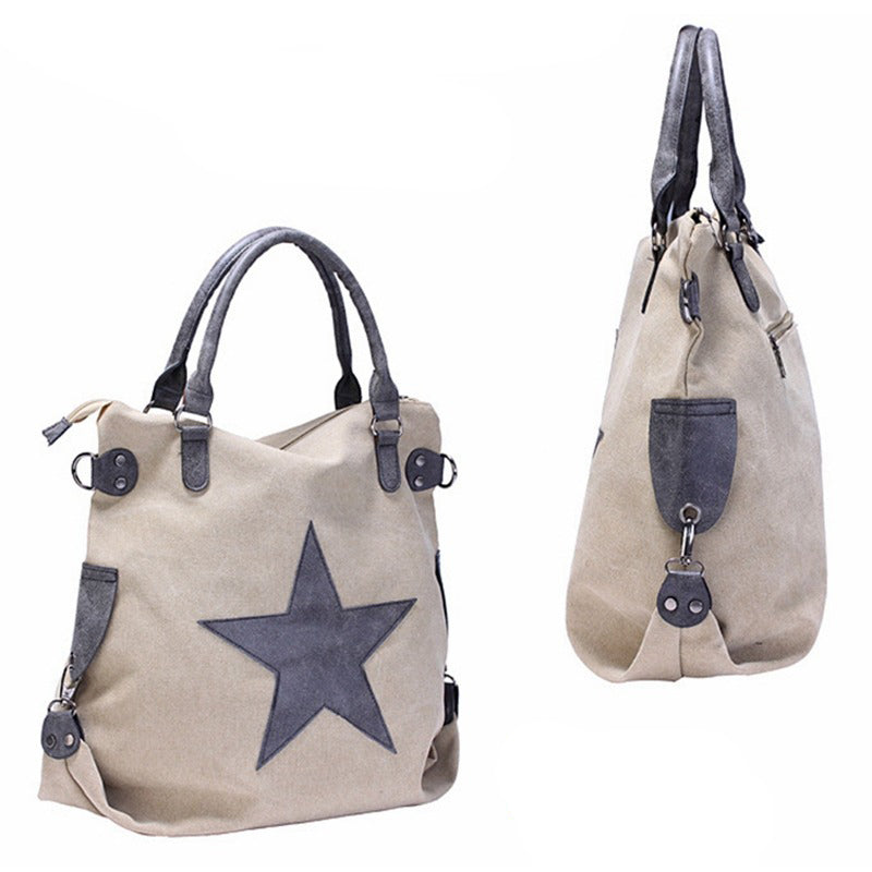 Canvas women shoulder bag with star on front, large capacity, vintage style, matte leather accents.
