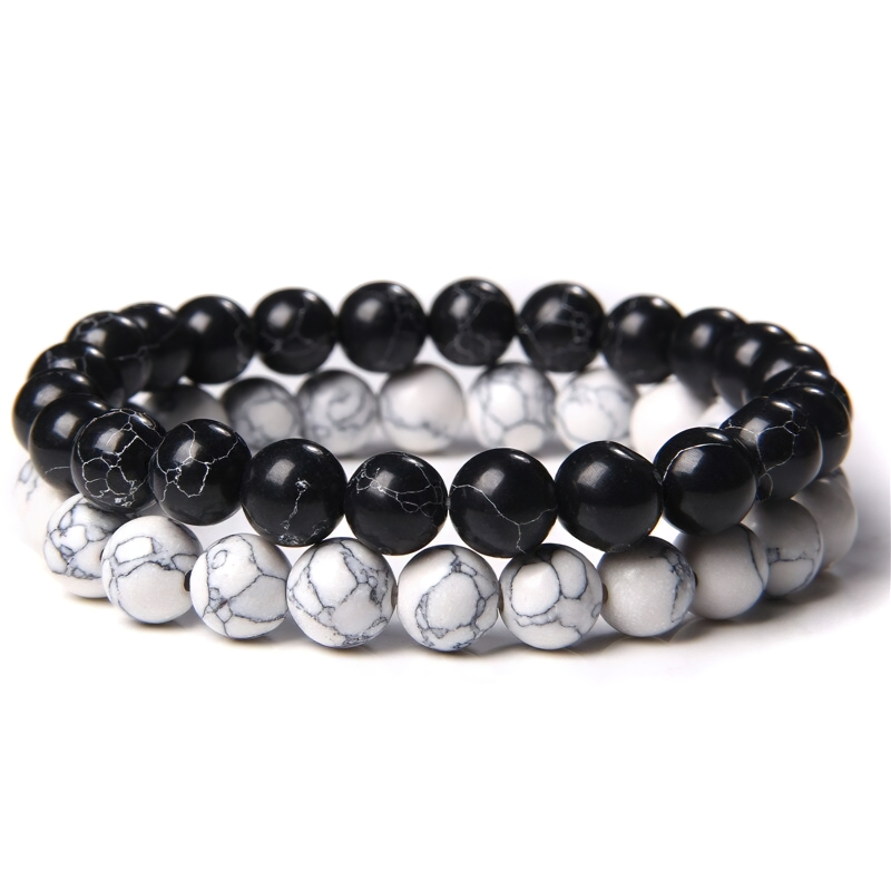 Unisex casual bangle made of natural black and white beads, perfect accessory for alternative fashion styles.